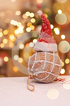 Christmas decoration with Santa hat and toy. Winter season holiday with light bokeh