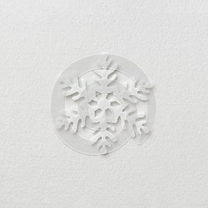Christmas decoration in the shape of a snowflake on a white background