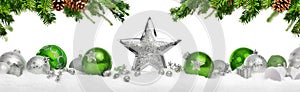 Christmas decoration in silver and green on white