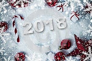 Christmas decoration on snow background with 2018