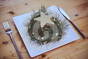 Christmas decoration star on a plate