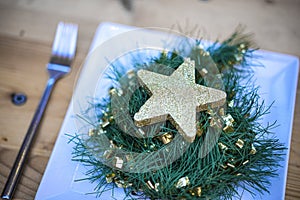 Christmas decoration star on a plate