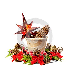 Christmas decoration (stars,pine cone, old pot and Christmas wreath) isolated on a white background