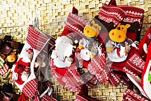 Christmas decoration stocking and toys hanging over rustic stone background