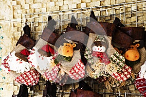 Christmas decoration stocking and toys hanging over rustic stone background