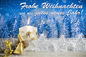 Christmas decoration with text in German `Frohe Weihnachten und ein gutes neues Jahr` photo