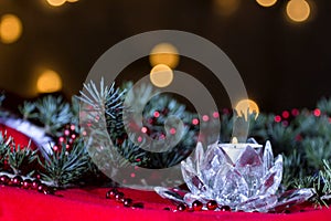 Christmas decoration with twig of fir and candle