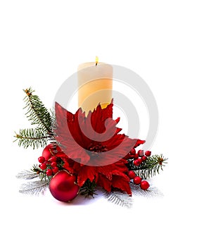 Christmas decoration. Flower of red poinsettia, candle, branch christmas tree, ball, red berries on a white background with space