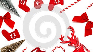 Christmas decoration white background. Stocking, gifts, winter tree, ribbon and bow in shape frame on white background for