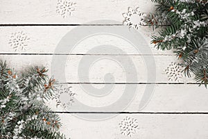 Christmas decoration on white grunge wooden board, copy space, winter background