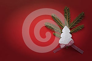 Christmas Decoration with White Wooden Christmas Tree on Red Background. Copy Space Wallpaper. Christmas Card.