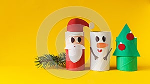 Christmas decoration for winter season. Holiday easy DIY craft idea for kids. Toilet paper roll tube toy. Santa snowman