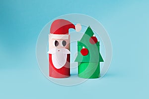 Christmas decoration for winter season. Holiday easy DIY craft idea for kids. Toilet paper roll tube toy. Santa snowman