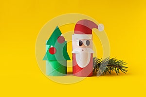 Christmas decoration for winter season. Holiday easy DIY craft idea for kids. Toilet paper roll tube toy. Santa snowman