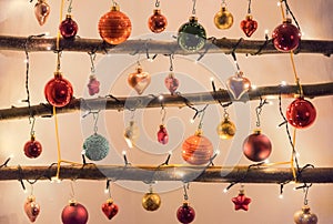 Christmas decoration wooden stacks with colorful baubles