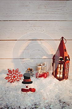 Christmas decorations against wooden wall
