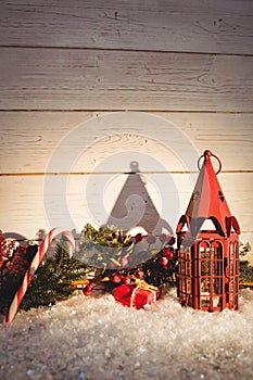 Christmas decorations against wooden wall