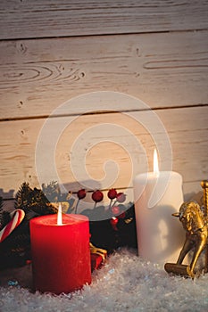 Christmas decorations against wooden wall