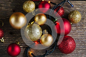 Christmas decorations balls on a wooden background
