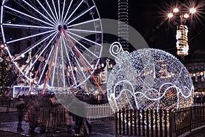 Christmas decorations and a big weel in George Square, Glasgow, Scotland.