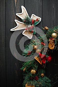 Christmas decorations on a black wooden background