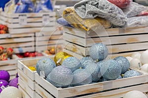 Christmas decorations in boxes. Balls for Christmas tree of blue light. Christmas preparation concept. Christmas background for