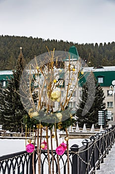 Christmas decorations on the branches in Belokurikha, Altai, Russia