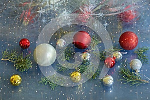 Christmas decorations. Colorful Christmas balls; bright festoon illumination - double exposure