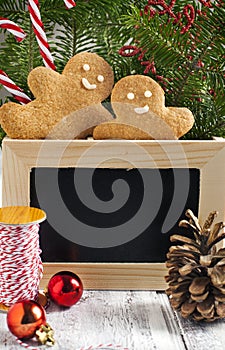 Christmas decorations with cookies and chalk blackboard