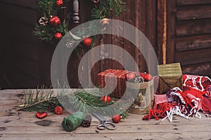 Christmas decorations at cozy wooden country house, outdoor setting on table