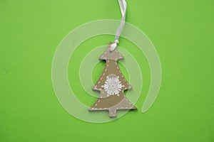 Christmas decorations decorative background. Decorative wooden white Christmas tree toy in the shape of a Christmas tree on a