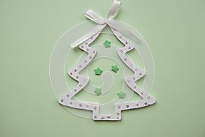 Christmas decorations decorative background. Decorative wooden white Christmas tree toy in the shape of a Christmas tree on a
