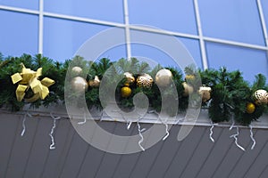 Christmas decorations in the form of green branches and balls