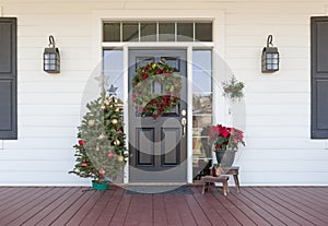 Christmas Decorations At Front Door of House photo