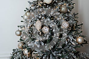 Christmas decorations in gray and beige tones with a light garland