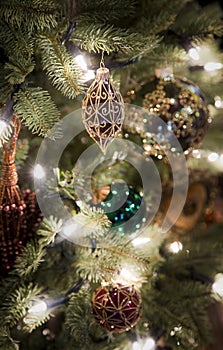 Christmas decorations hanging on a tree.