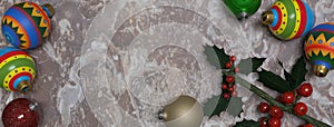 Christmas decorations with holly in a web banner