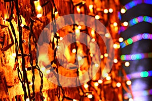 Christmas decorations with lights garland in the snow