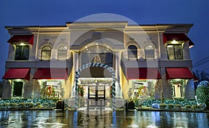 Christmas Decorations and Lights on Stately Building at Twilight