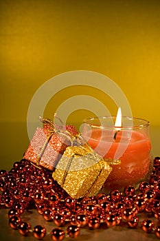 Christmas decorations with lit Candle