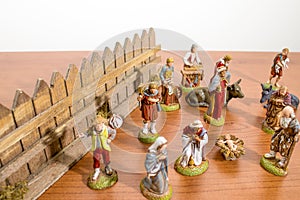 Christmas decorations, nativity scene statues on a wood table