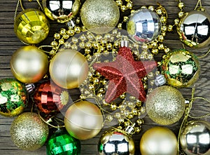 Christmas decorations on old wooden background.