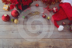 Christmas decorations and ornament on wooden background. View from above with copy space