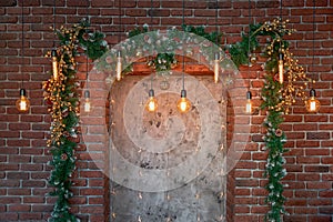 Christmas decorations over the decorative fireplace on the wall