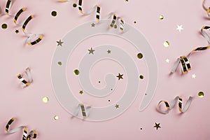 Christmas decorations on pink background