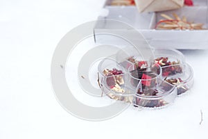 Christmas decorations in red and gold colors on white background with empty copy space for text. holiday and celebration concept f