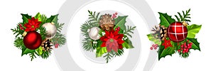 Christmas decorations with red and silver Christmas balls, fir branches, cones, poinsettia flowers, holly, and mistletoe