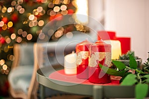 Christmas decorations red wax candles background new year tree