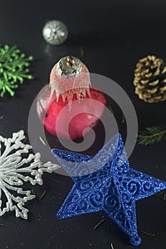 Christmas decorations with reflection on black background