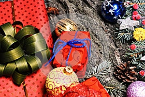 Christmas decorations on rough grey wooden texture background.